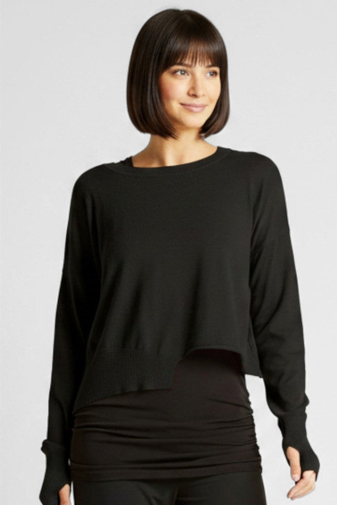 Just Perfect Collection Online black Pima cotton mini knit crew sweater with drop shoulders and a cut-out hem.