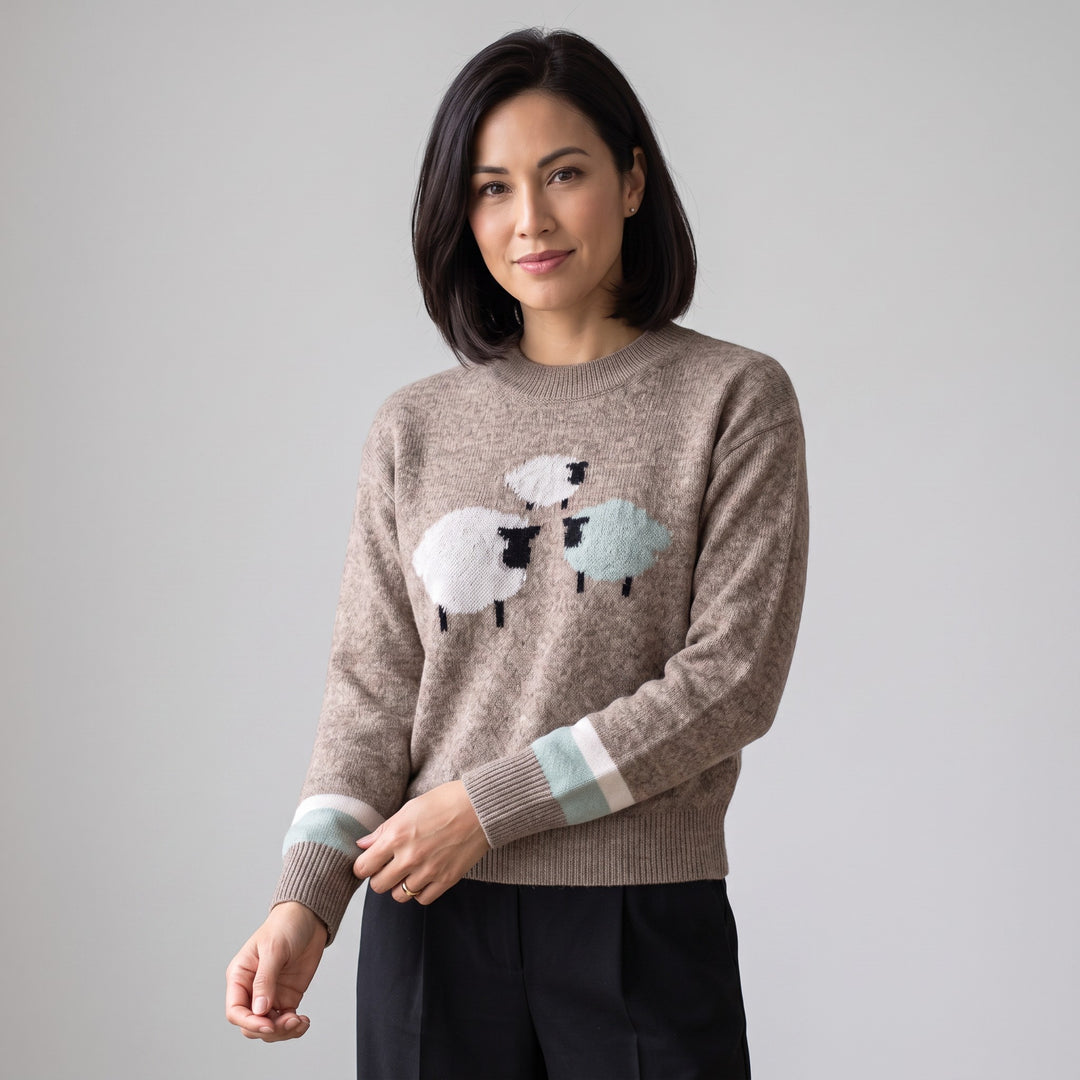 Just Perfect Collection Online coffee brown crew neck sweater featuring a playful sheep pattern and ribbed cuffs