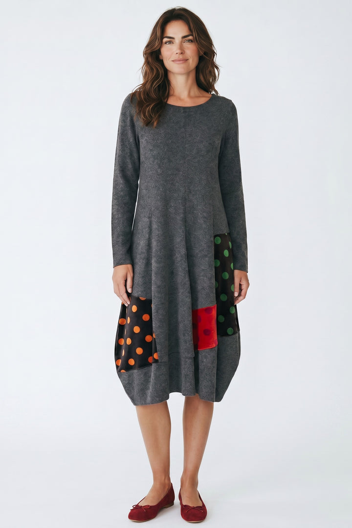Just Perfect Collection Online grey long-sleeve bubble hem dress with colourful polka dot and solid patch details.