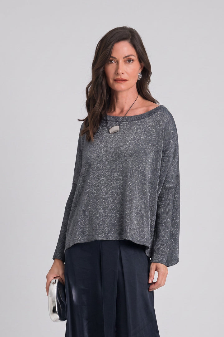 Model wearing a Just Perfect Collection Online midnight blue reversible Pima cotton sweater with lurex shimmer.
