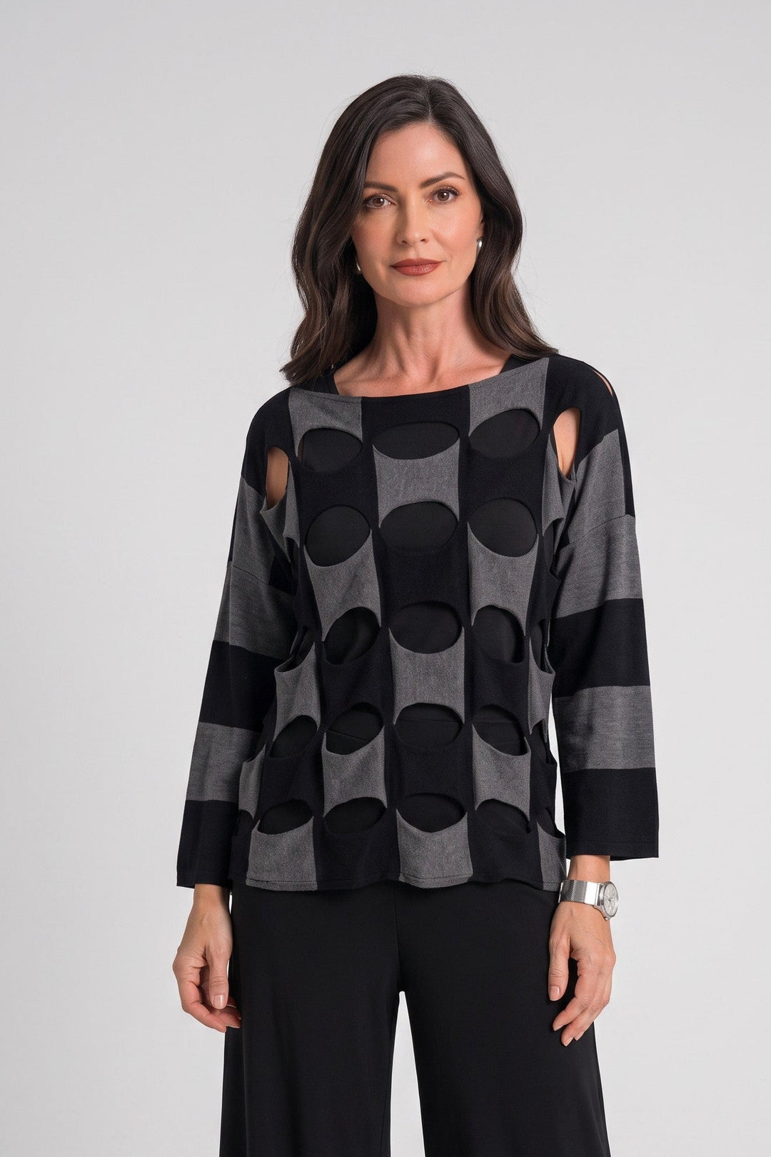 Just Perfect Collection Online black and grey Pima cotton sweater with a two-tone oval cutout pattern on a model.