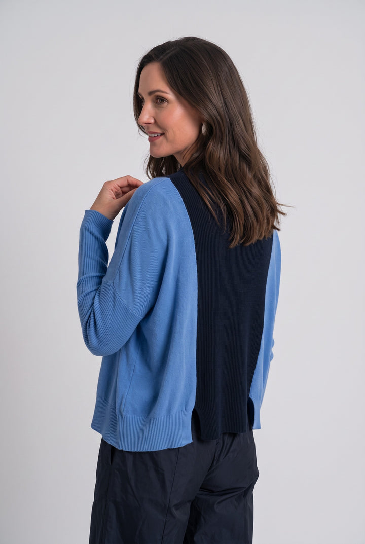 Woman wearing Just Perfect Collection Online Pima cotton sweater in marina blue and midnight with sporty back panel