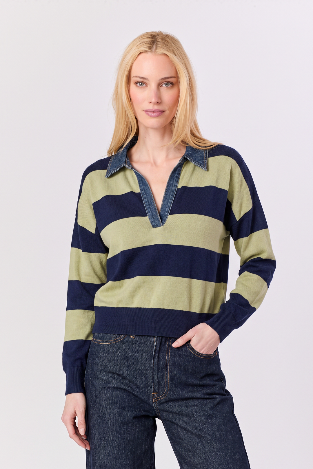 Model wearing Just Perfect Collection Online navy and olive green striped polo shirt with denim collar trim