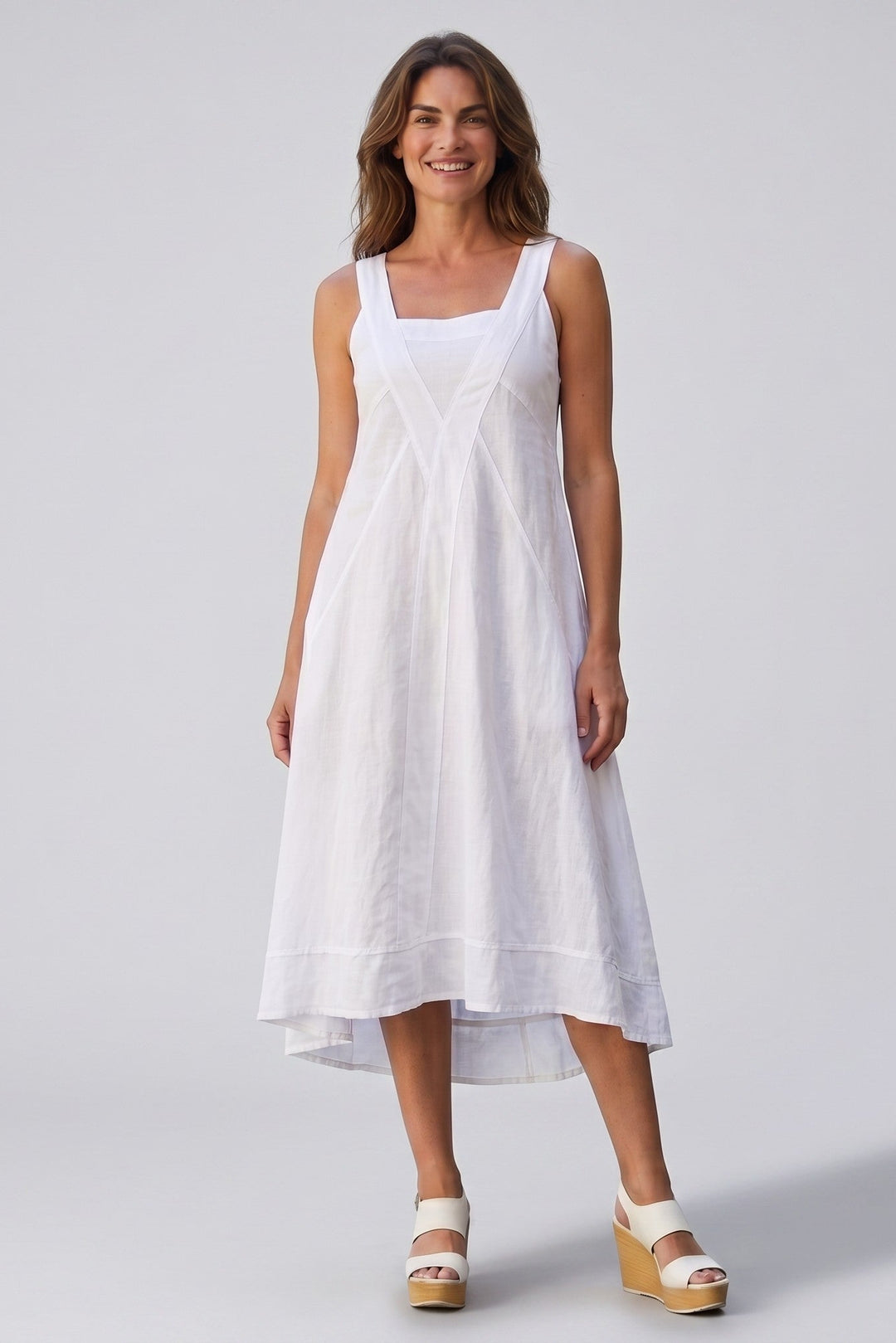 Just Perfect Collection Online white linen midi dress with cross front detail, rib knit accents, and flared skirt.