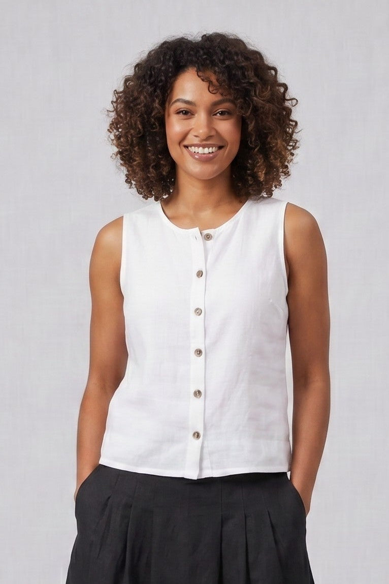 Model wearing a Just Perfect Collection Online white linen button-front sleeveless tank top with a black midi skirt.