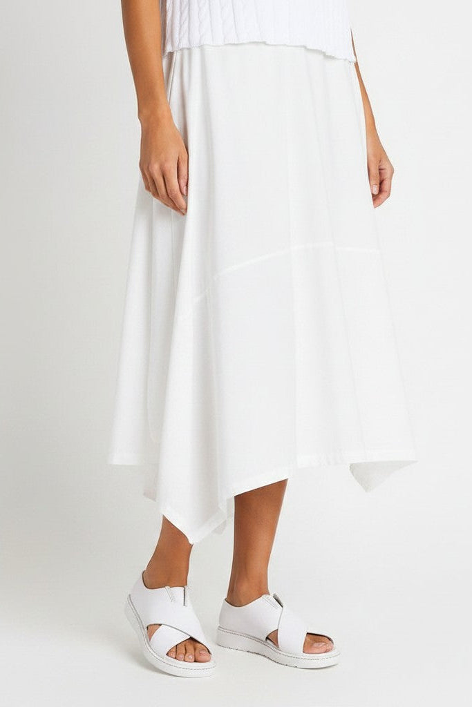 Just Perfect Collection Online white nylon architectural skirt with pleating and asymmetric hem.