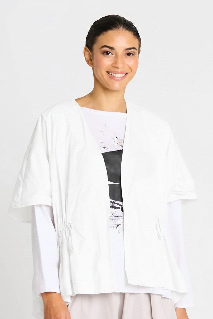 Just Perfect Collection Online white nylon drawstring vest with adjustable waist and drop shoulders.