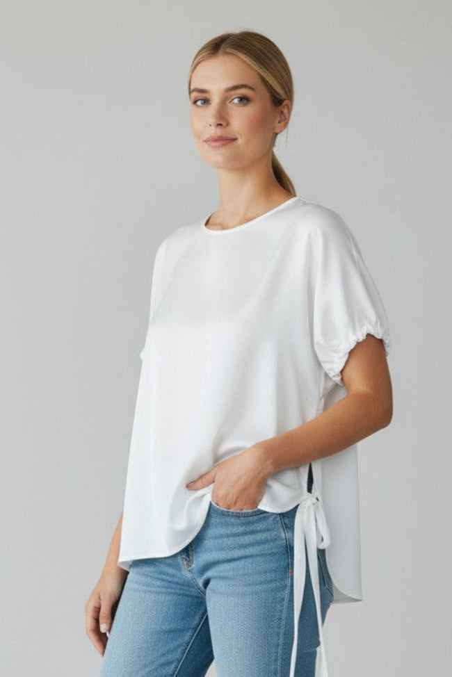 Just Perfect Collection Online green short-sleeve boxy top with ruched cuffs and tie detail.