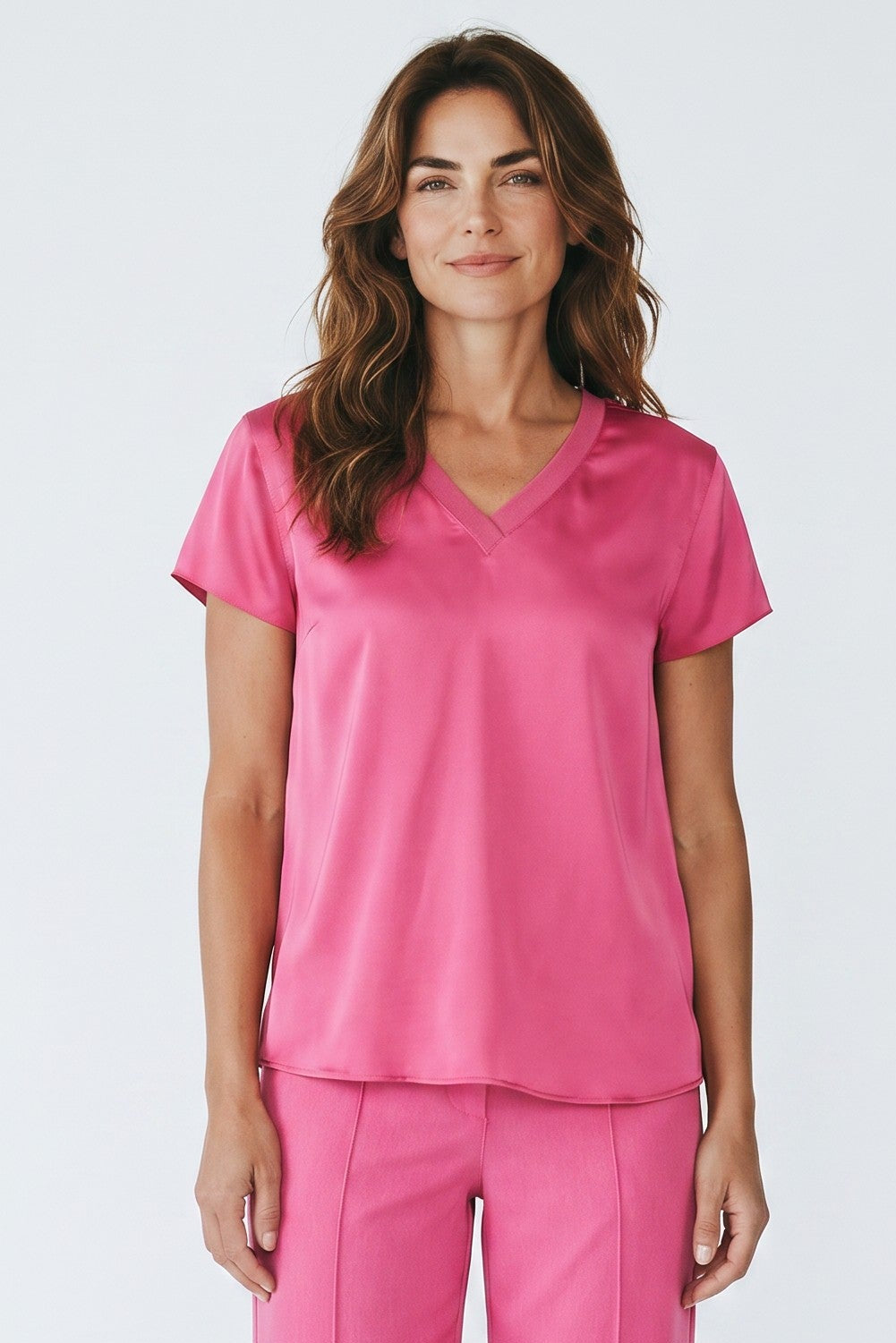 Just Perfect Collection Online hot pink satin V-neck top with double-self sleeves and high-low hem.