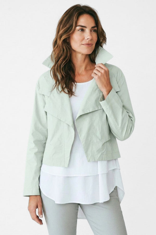 Just Perfect Collection Online mint green nylon triple collar jacket worn by a woman. Lightweight outerwear with a sleek silhouette.