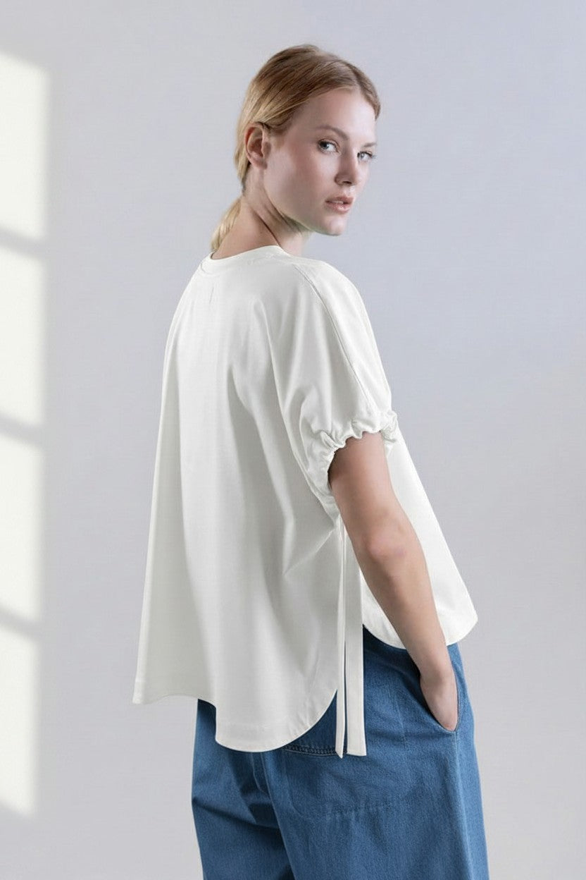 Just Perfect Collection Online white short-sleeve boxy top with gathered cuffs and tie detail.